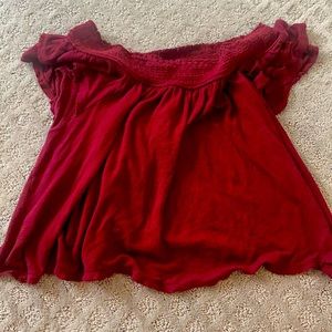 off the shoulder red flows shirt